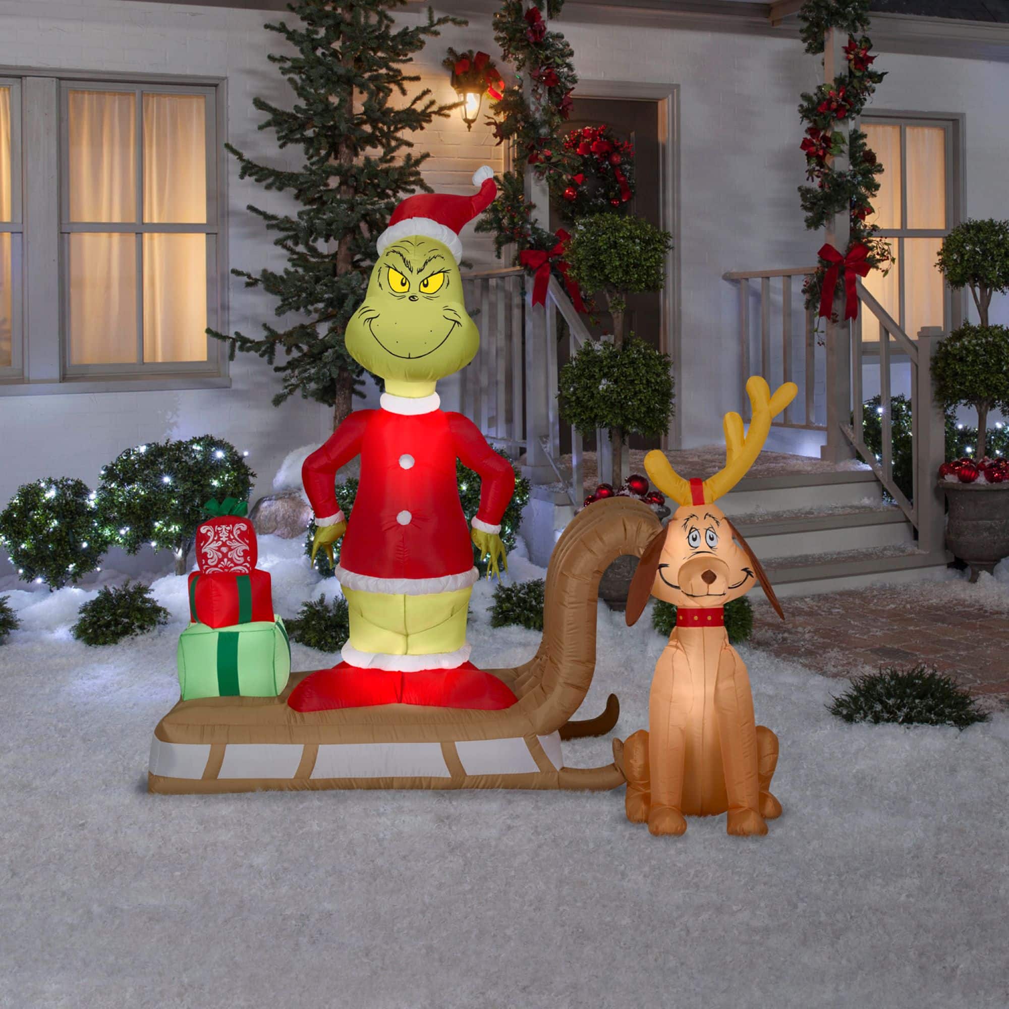 6ft. Airblown® Inflatable Christmas Grinch & Max Sled Scene with Gift Stack